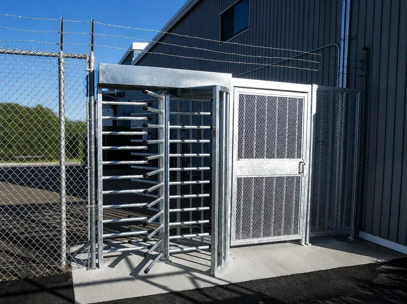 Boon Edam Turnlock 100 full-height turnstile installation with side gate